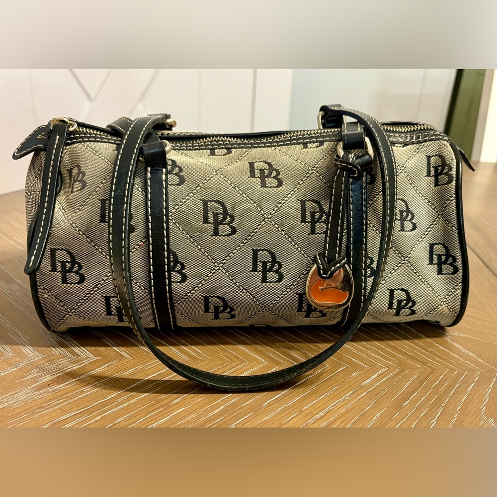 Dooney & Bourke Canvas Leather Trim Barrel Bag. Used.